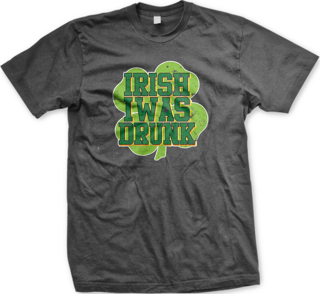 A grey t-shirt with a graphic design featuring the text "IRISH WAS DRUNK" in a stylized font, surrounded by a shamrock symbol.