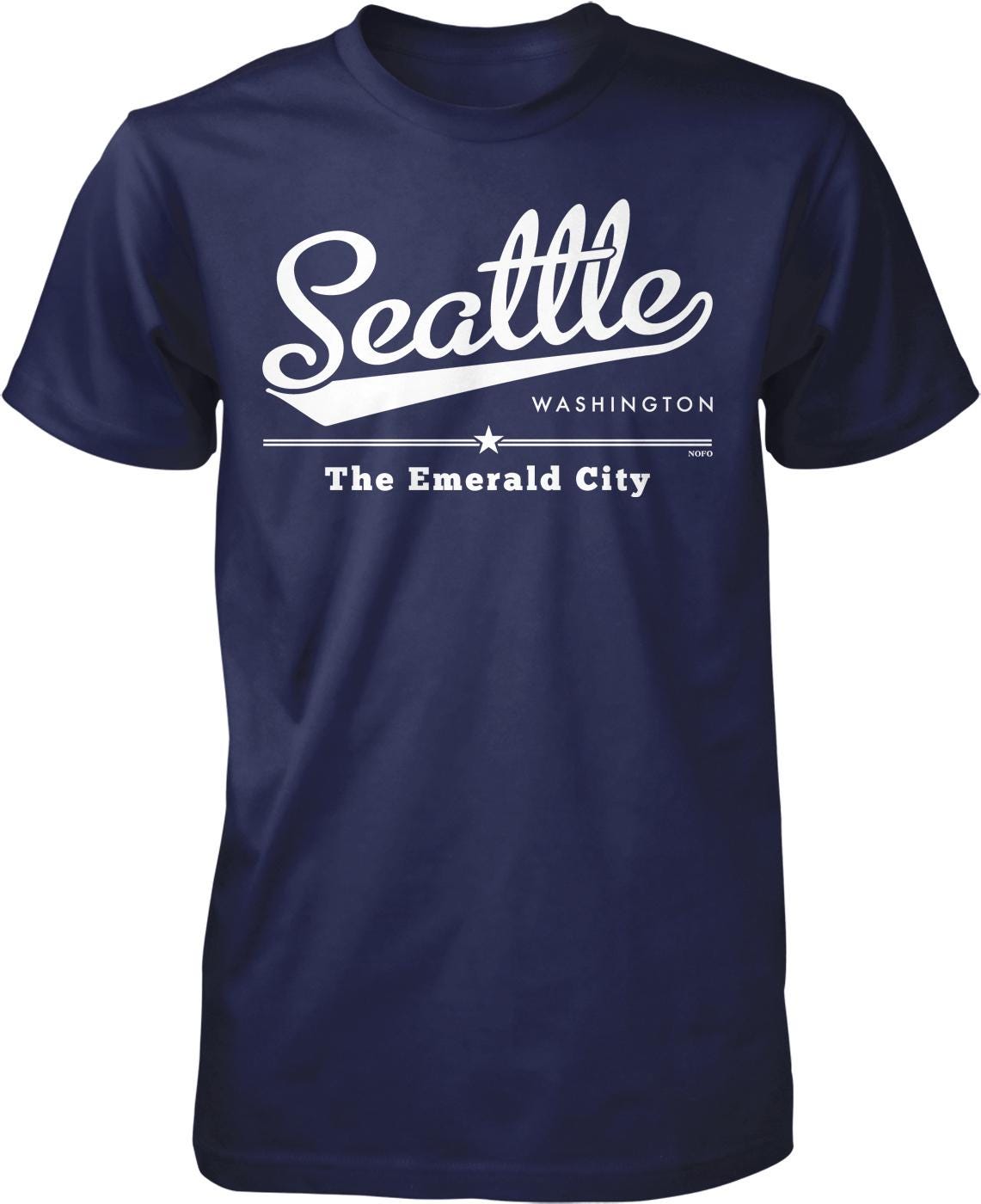 A navy blue t-shirt with white text and graphics that say "Seattle Washington The Emerald City".