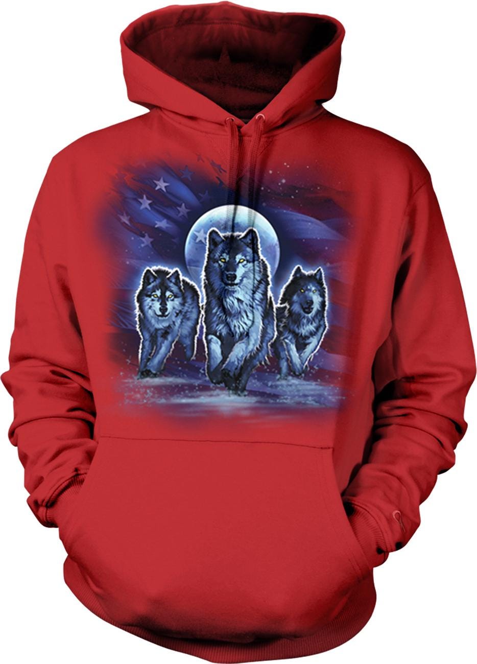 A red hoodie with a graphic design depicting three wolves walking together under a full moon.