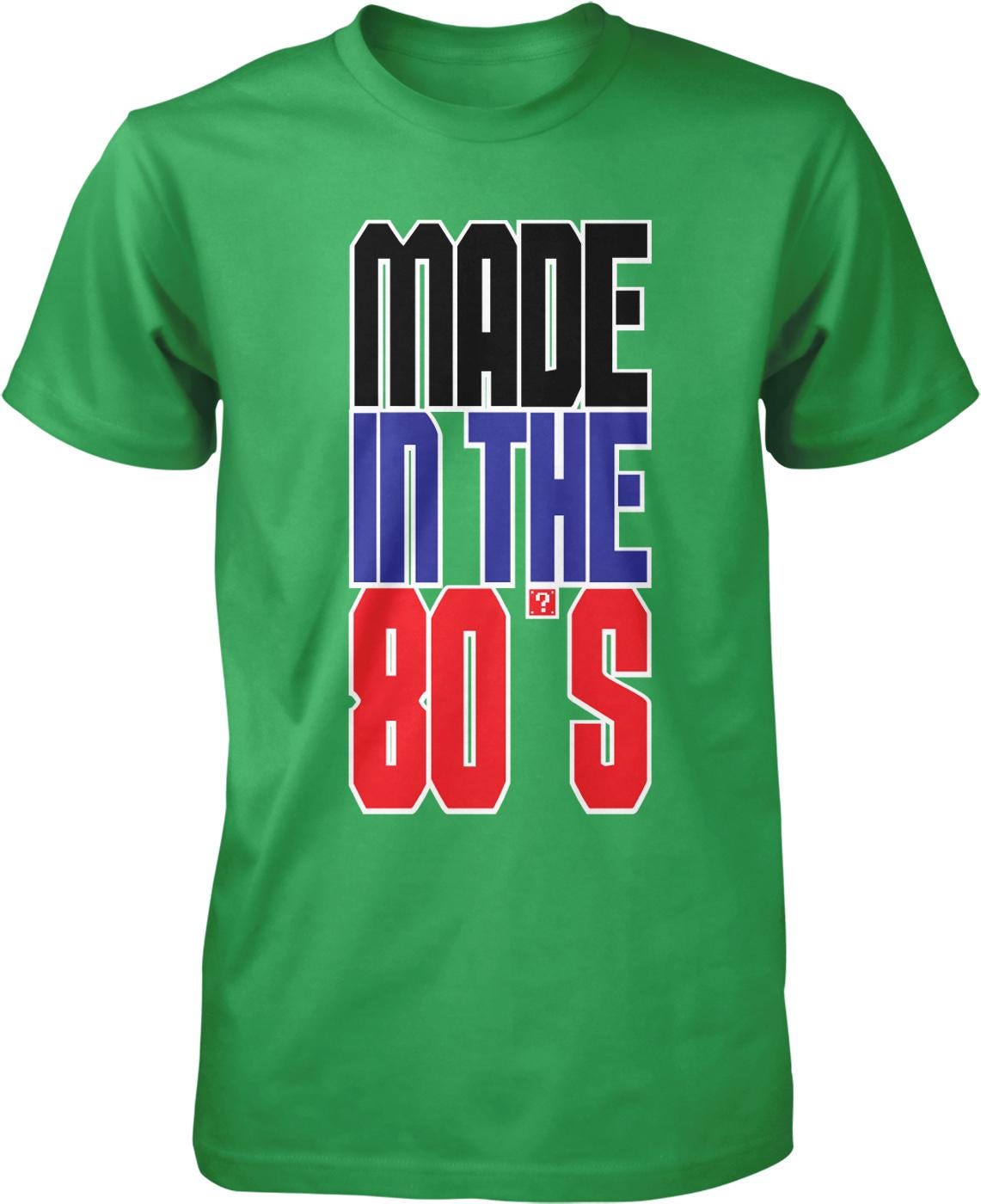 A green t-shirt with the text "MADE IN THE 80'S" printed on it.