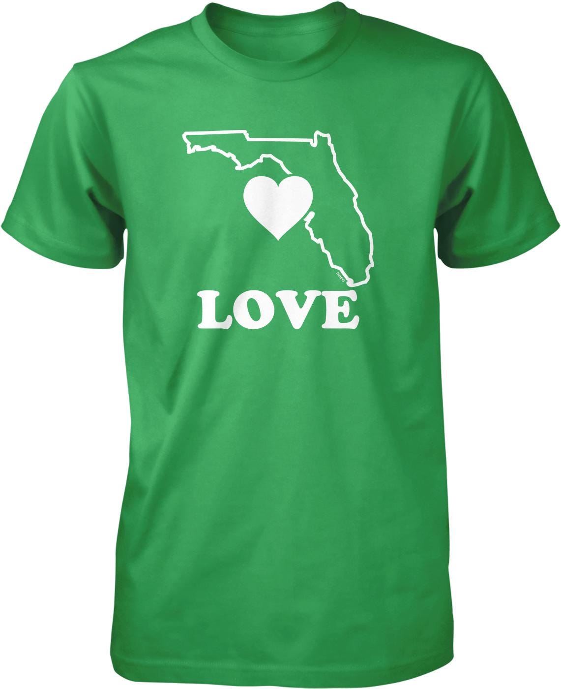 A green t-shirt with a white graphic design that says "LOVE" and features a heart shape inside a map of Florida.