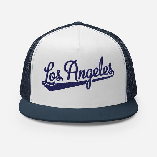 A white and navy blue baseball cap with the text "Los Angeles" printed on it.