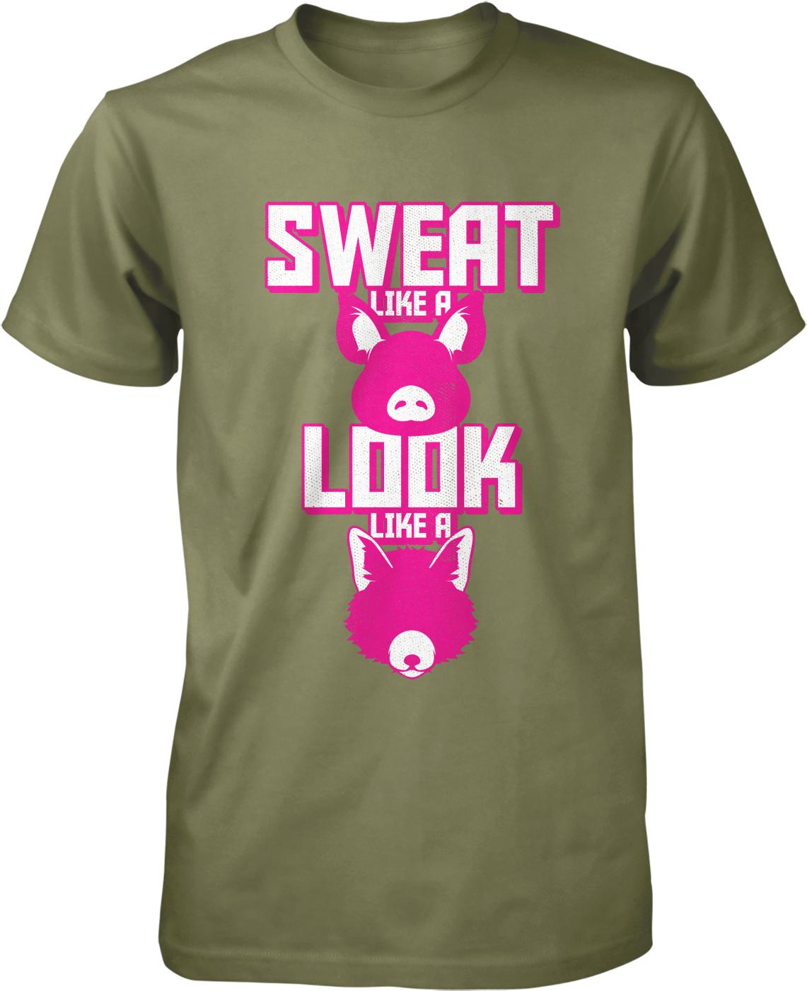 A green t-shirt with a graphic design featuring a pink pig and the text "SWEAT LIKE A LOOK LIKE A PIG".