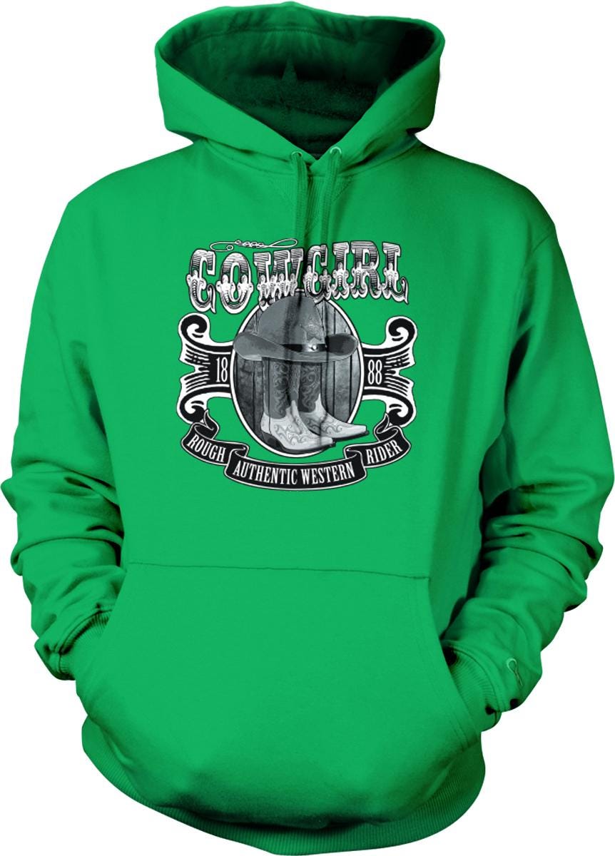 A bright green hoodie with a graphic design featuring a cowboy hat, boots, and the text "COWBOY" prominently displayed.