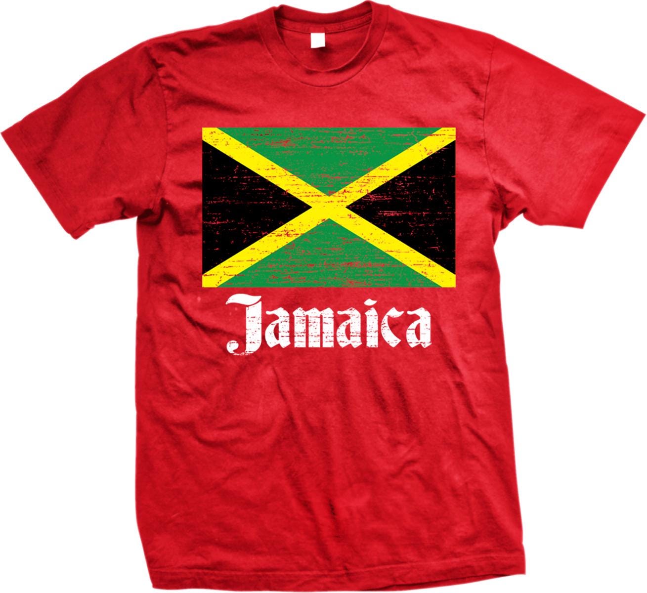 A red t-shirt with a graphic of the Jamaican flag and the word "Jamaica" printed on it.