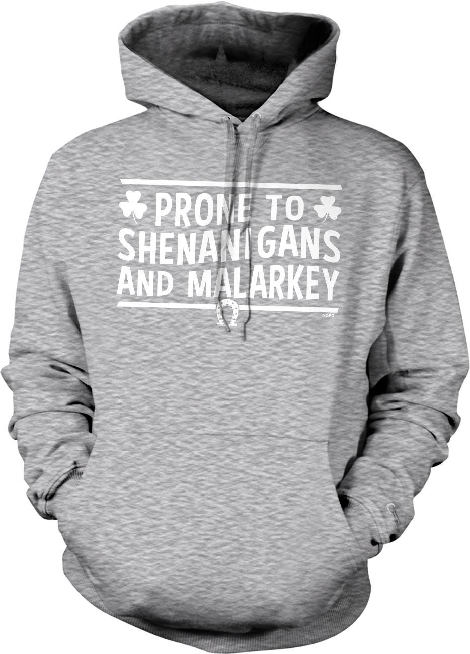 A grey hoodie with white text printed on it.