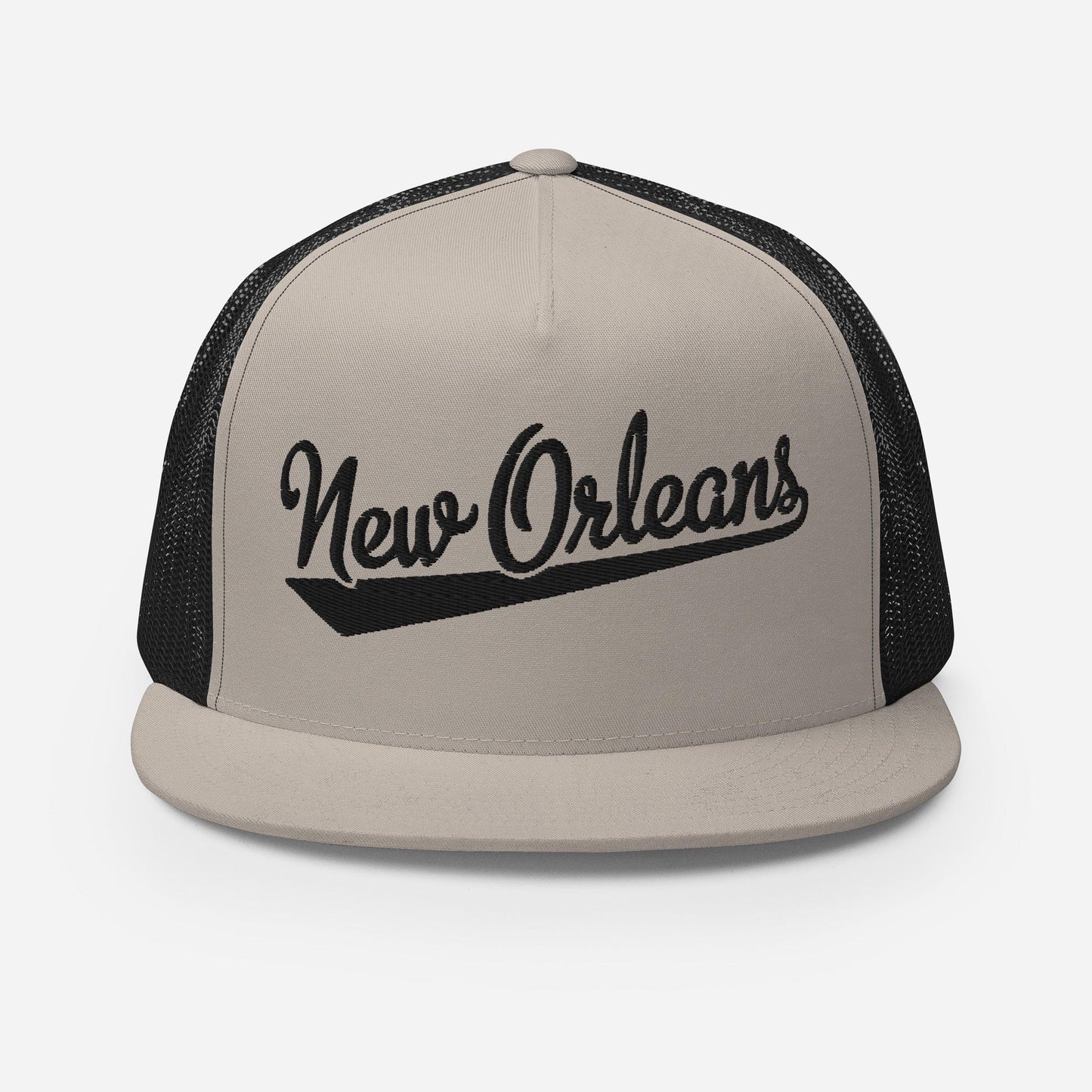 A beige baseball cap with the text "New Orleans" printed on it in a stylized font.
