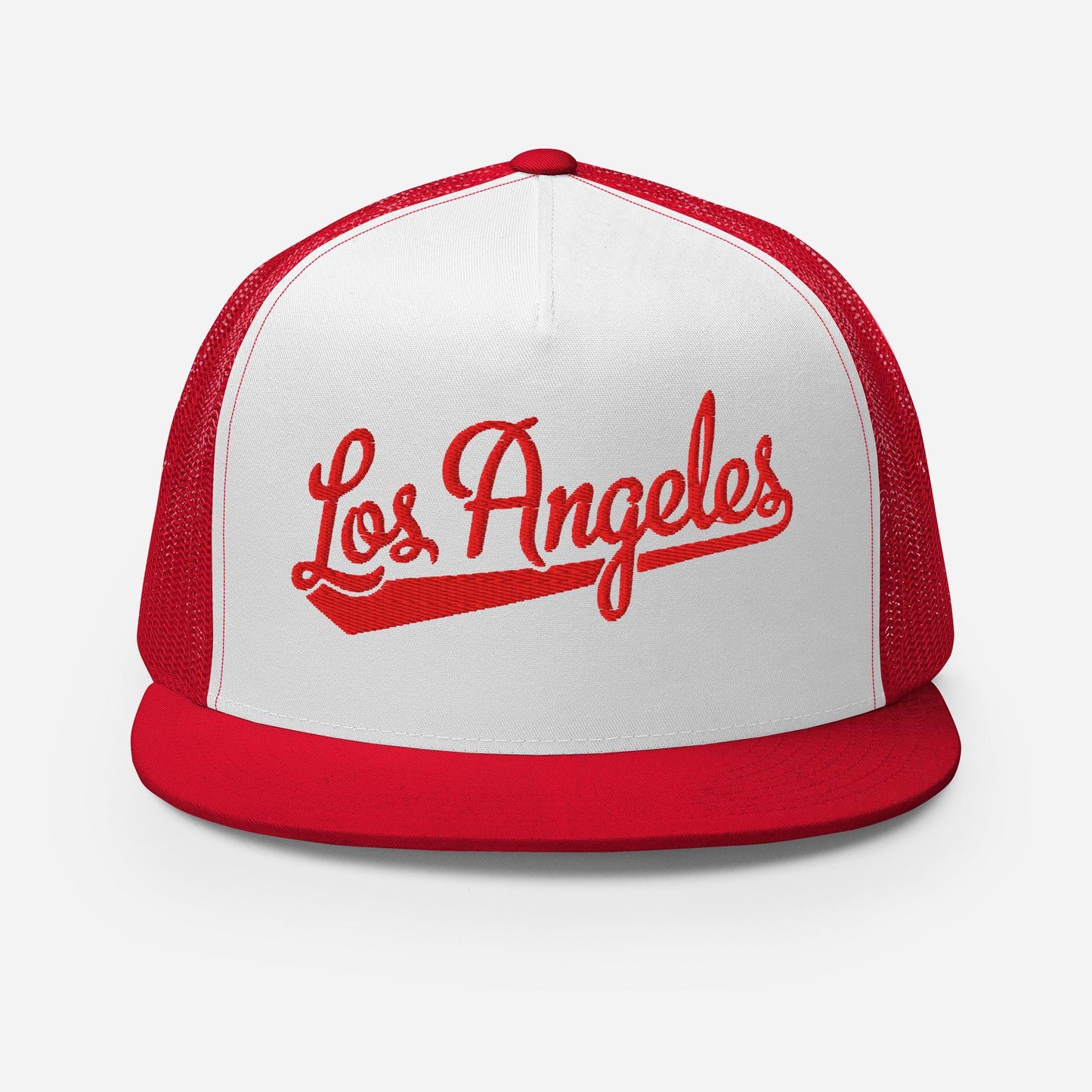 A red and white baseball cap with the text "Los Angeles" printed on it.