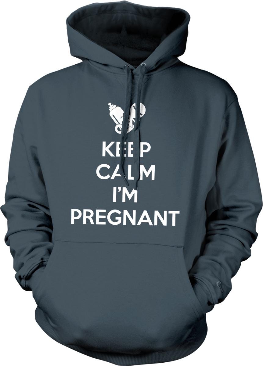 A gray hoodie with the text &quot;KEEP CALM I&#39;M PREGNANT&quot; printed on it.