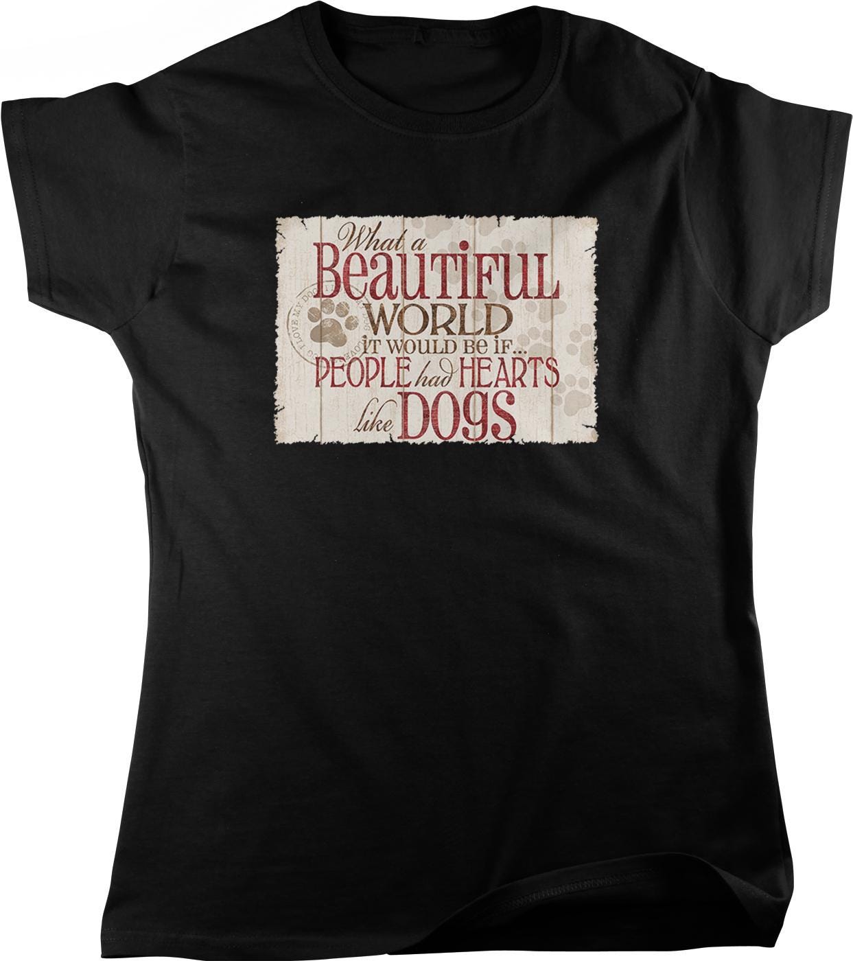 A black t-shirt with a printed message that reads "What a Beautiful World it would be if people had hearts like dogs".