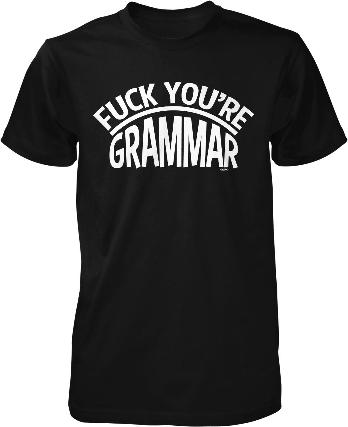 A black t-shirt with the text "FUCK YOU'RE GRAMMAR" printed on it in white letters.